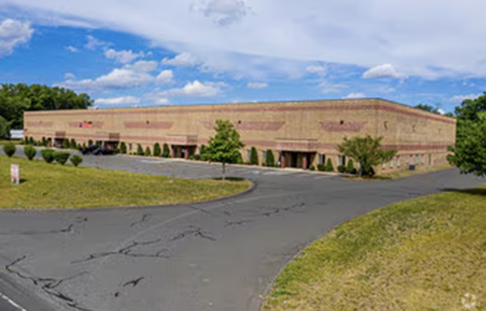 Newmark and Sentry Commercial  complete 56,720 s/f industrial lease